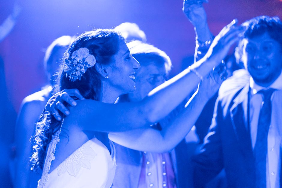 Guests dancing and celebrating at a vibrant wedding reception